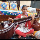 YOUNGEST TO PLAYING SONGS ON VEENA
