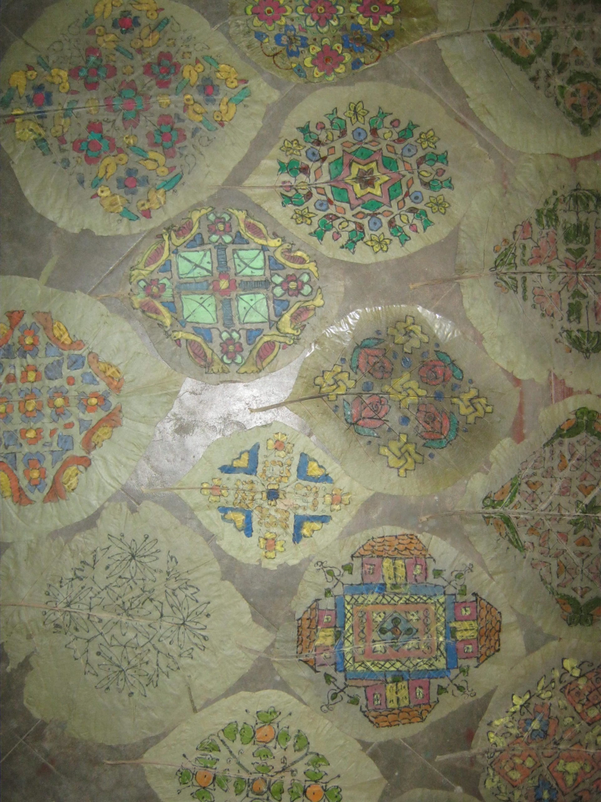 VERITY RANGOLI DESIGNS ON TEAK LEAVES