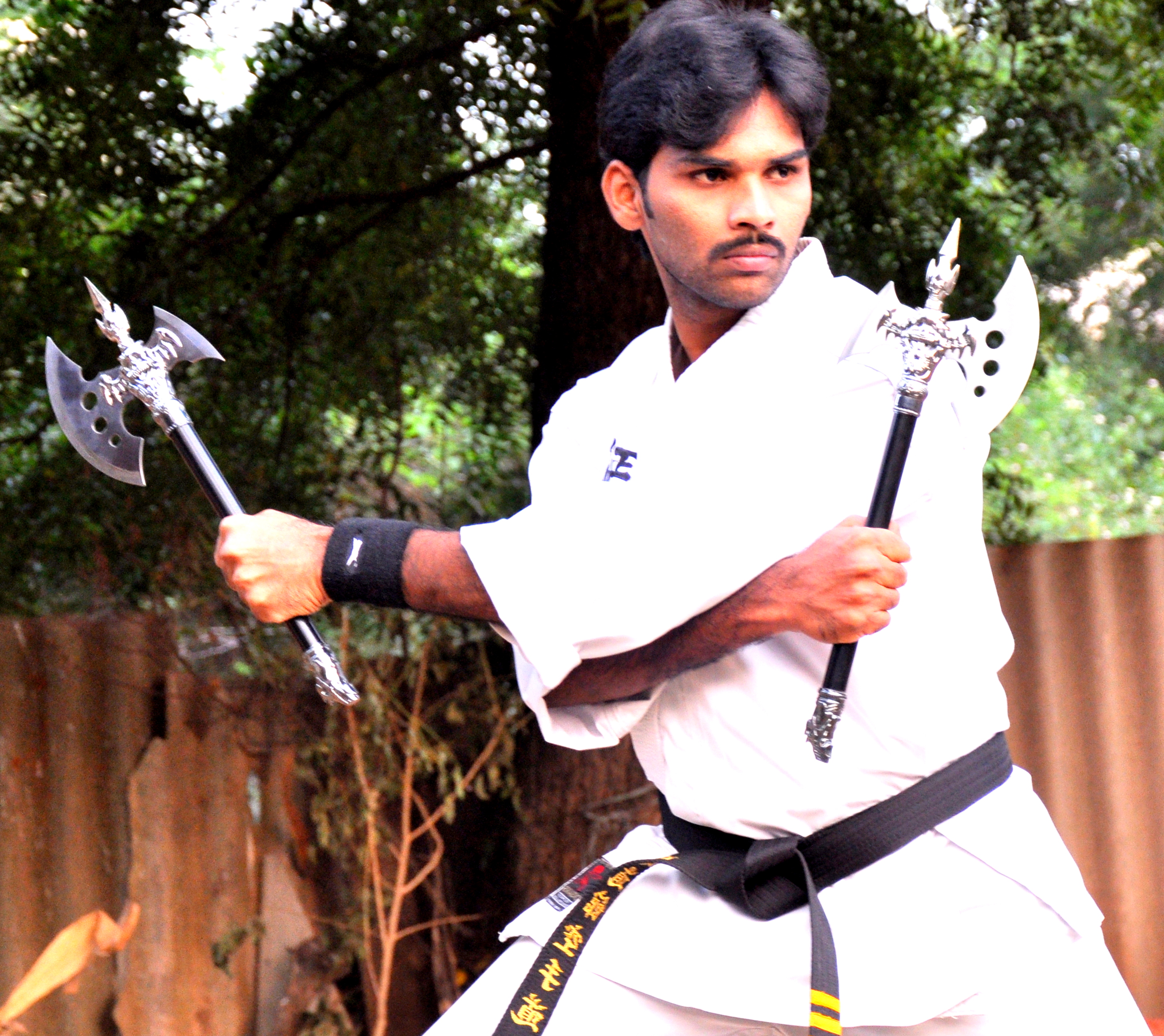 ACHIEVED FOUR INTERNATIONAL KARATE BLACK BELTS BY HANDICAPPED IN YOUNGEST AGE