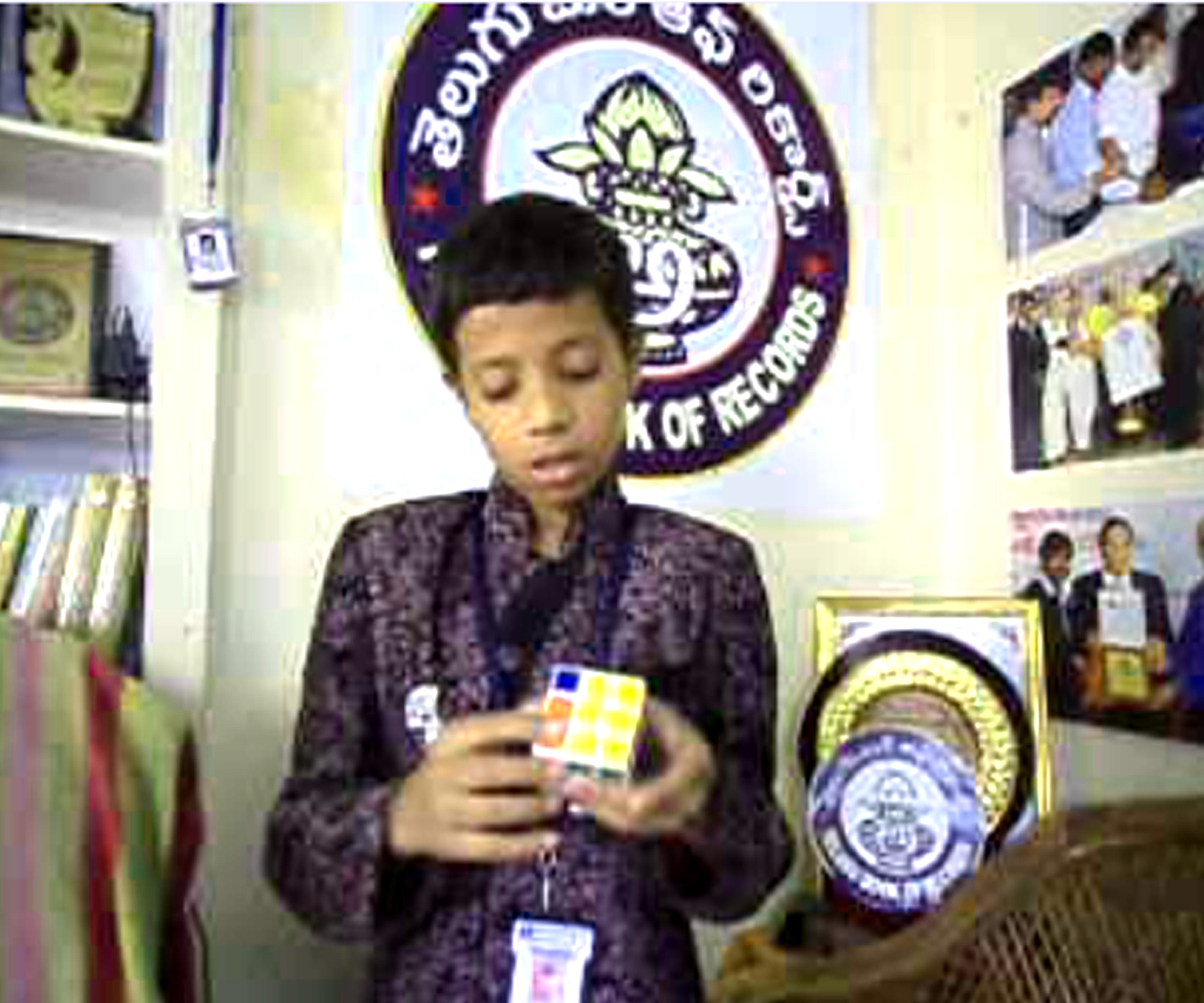 FASTEST TIME TO SOLVED A RUBIK’S CUBE WHILE SINGING OUR NATIONAL ANTHEM