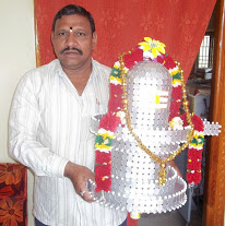 SHIVA LINGAM STRUCTURE BUILD WITH 5 PISA COINS