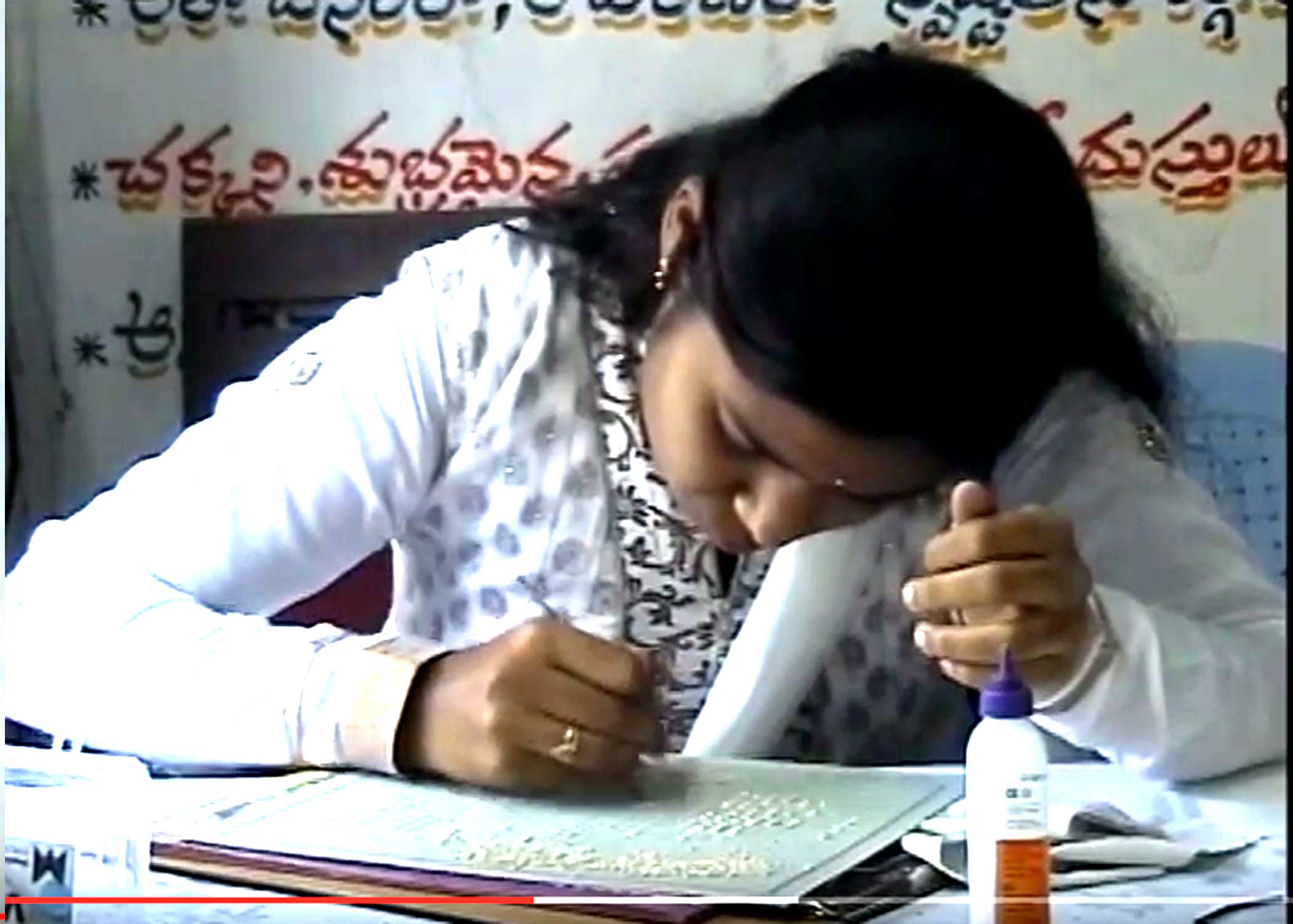FASTEST TIME TO WRITE TELANGANA STATE ANTHEM ON SESAME SEEDS
