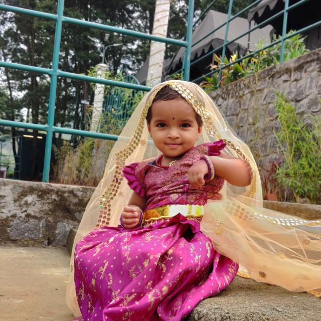 BY LISTENING TO MUSIC AND COULD NAME THE SONGS AT THE AGE OF 19 MONTHS