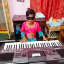 MOST SONGS PLAY ON THE KEYBOARD WHILE BLINDFOLDED