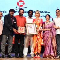 “RECITATION OF 50 VERSES FROM THE SRIMAD BHAGAVAD GITA BY IMMEDIATELY BY THE ARTISTIC PRESENTATION OF THE MEANING OF EACH CORRESPONDING VERSE THROUGH TRADITIONAL KUCHIPUDI DANCE,